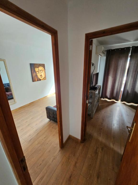 Postel nebo postele na pokoji v ubytování SEVEN Hostal
