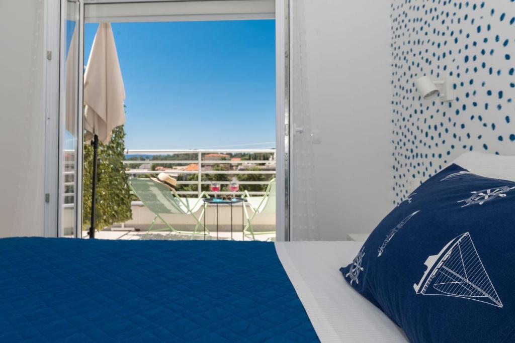 Posteľ alebo postele v izbe v ubytovaní Apartman M6