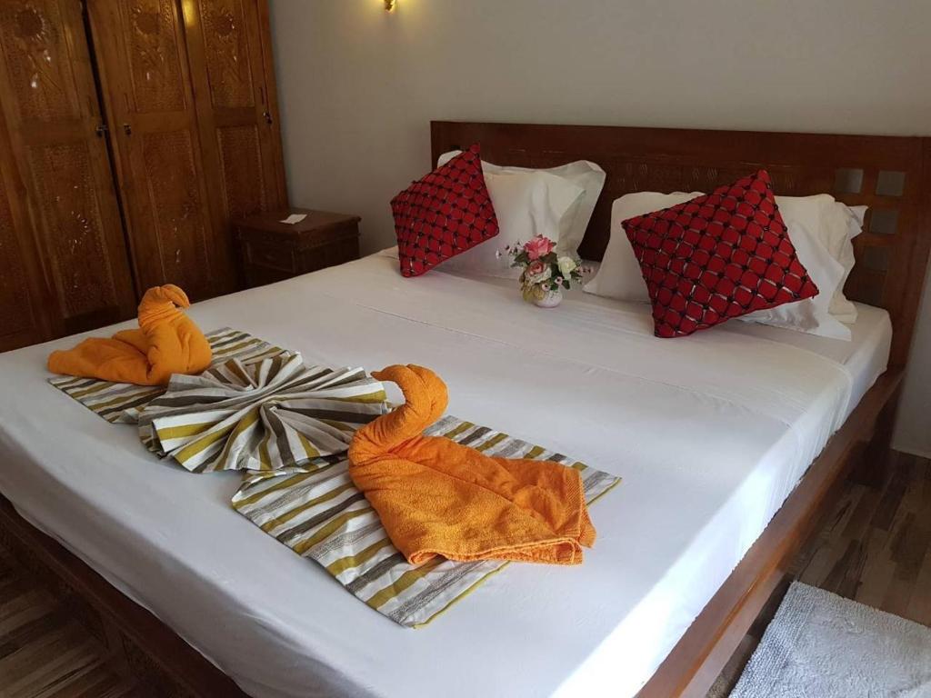 Postel nebo postele na pokoji v ubytování Easy Stay Residence