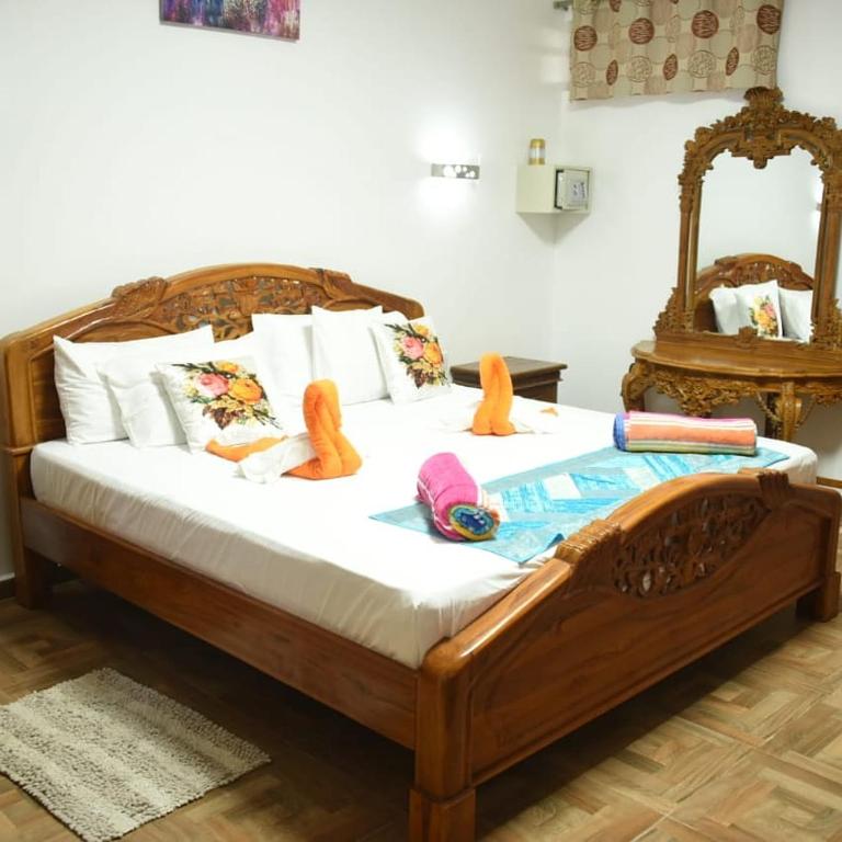 Postel nebo postele na pokoji v ubytování Easy Stay Residence