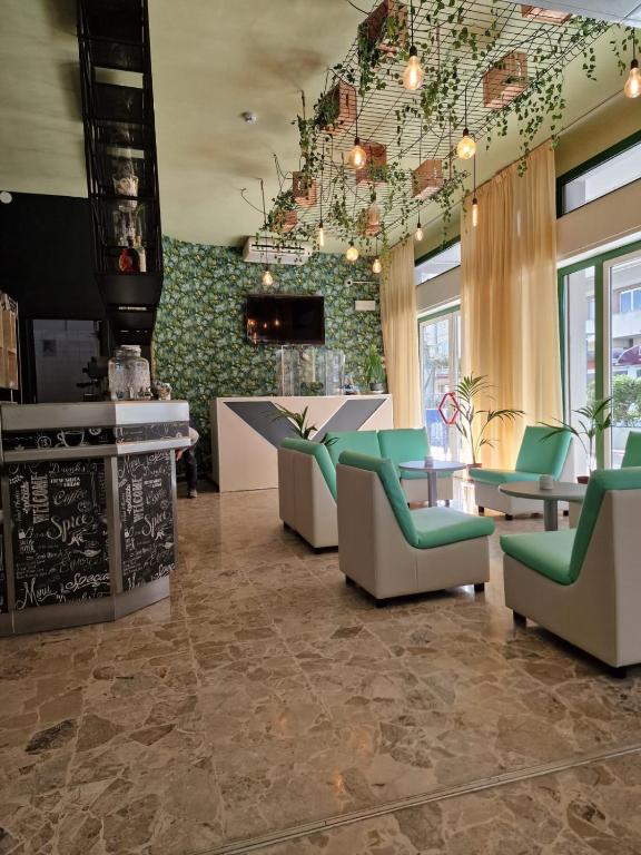 TV a/nebo společenská místnost v ubytování Hotel Venezia Beach