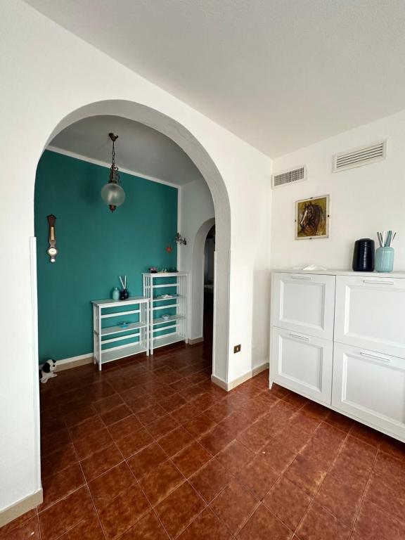 Łóżko lub łóżka w pokoju w obiekcie Residenza Elaya La Maddalena
