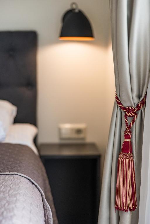 Llit o llits en una habitació de Vila Amber drop