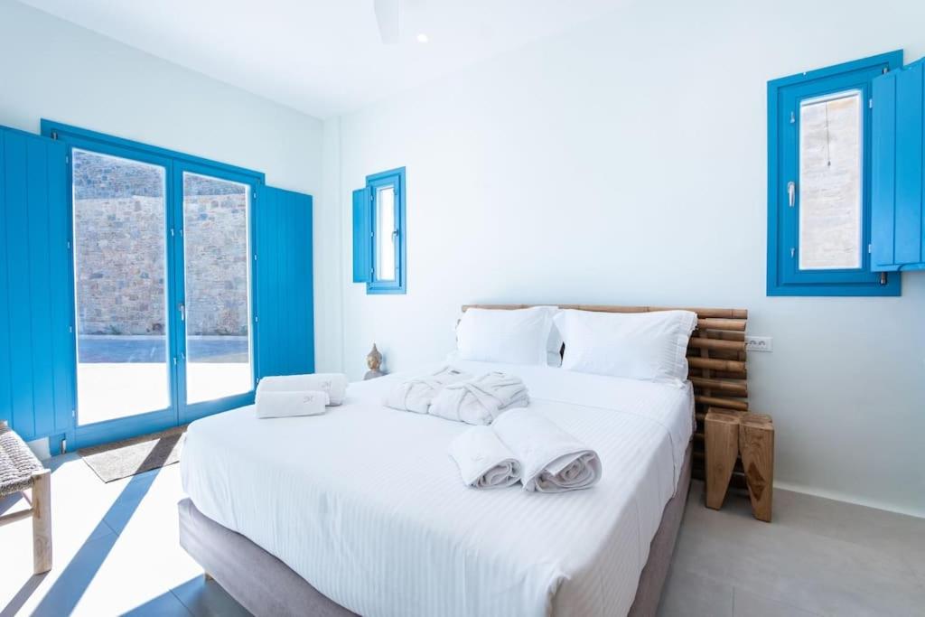 Łóżko lub łóżka w pokoju w obiekcie Star villa by Bestofmikonos