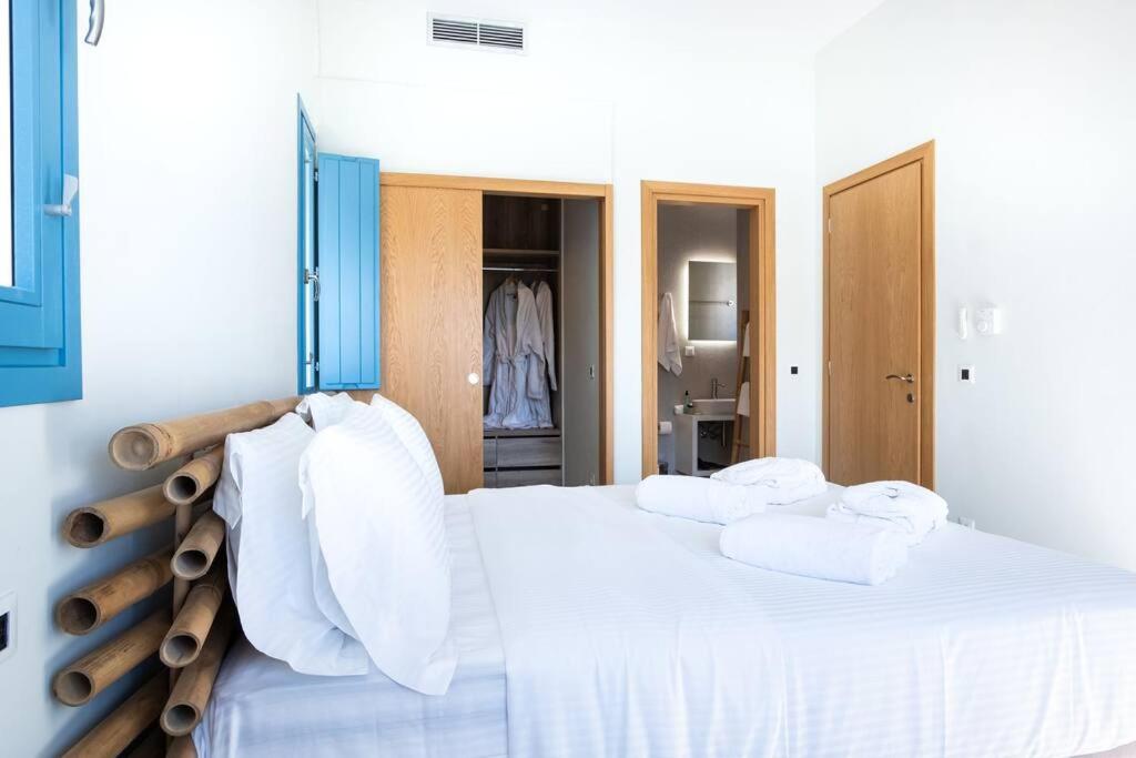 Łóżko lub łóżka w pokoju w obiekcie Star villa by Bestofmikonos