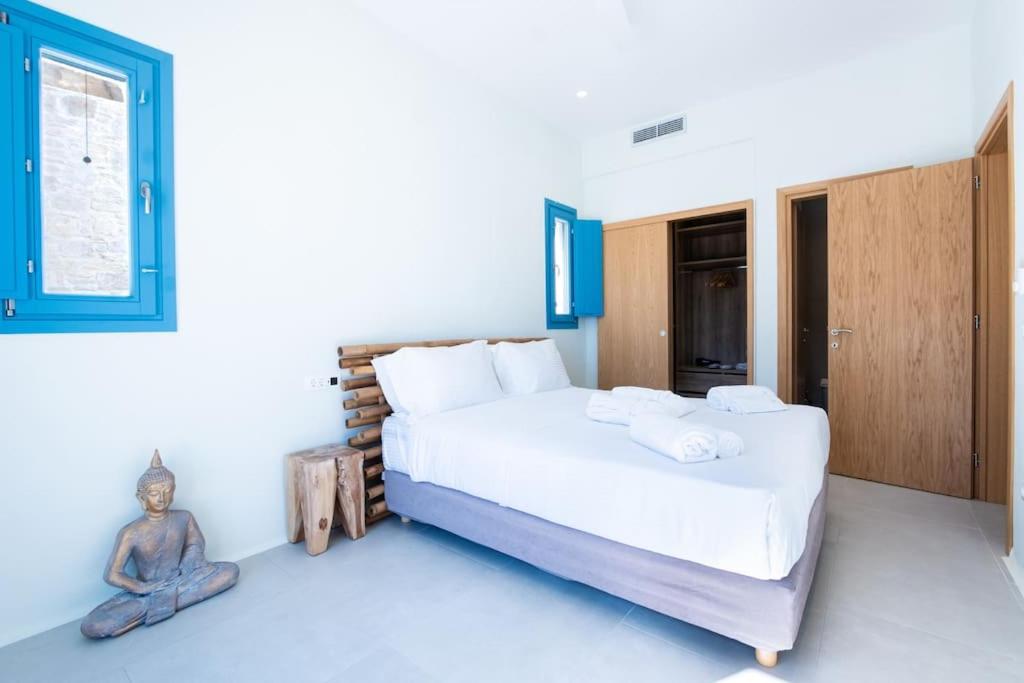 Łóżko lub łóżka w pokoju w obiekcie Star villa by Bestofmikonos