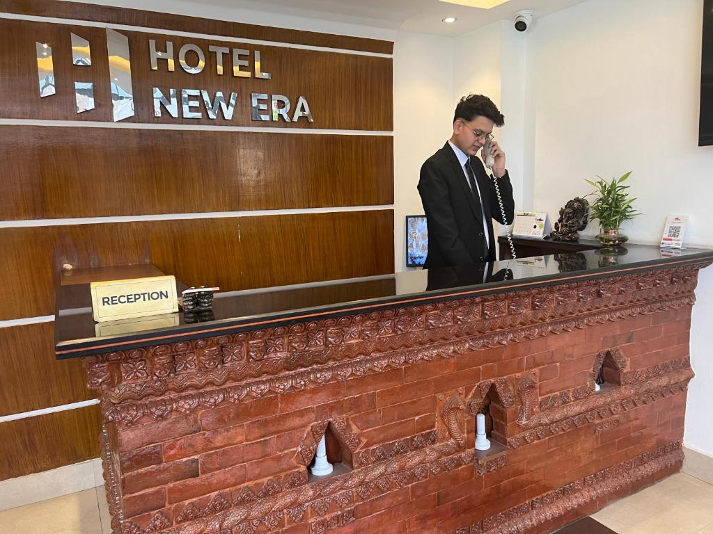 Členové personálu v ubytování Hotel New Era