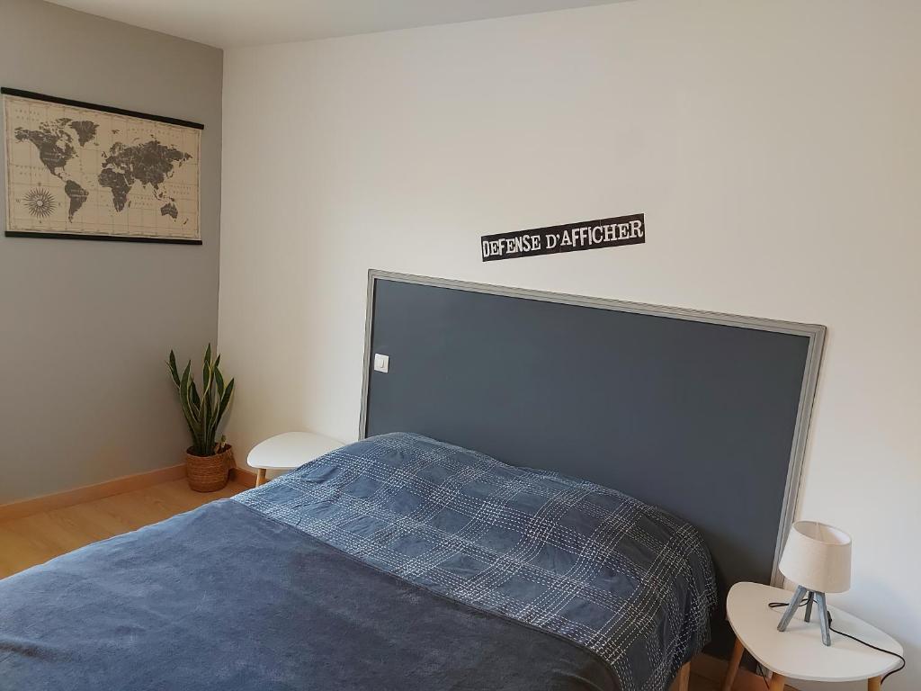 Postel nebo postele na pokoji v ubytování L'Arbonnaise