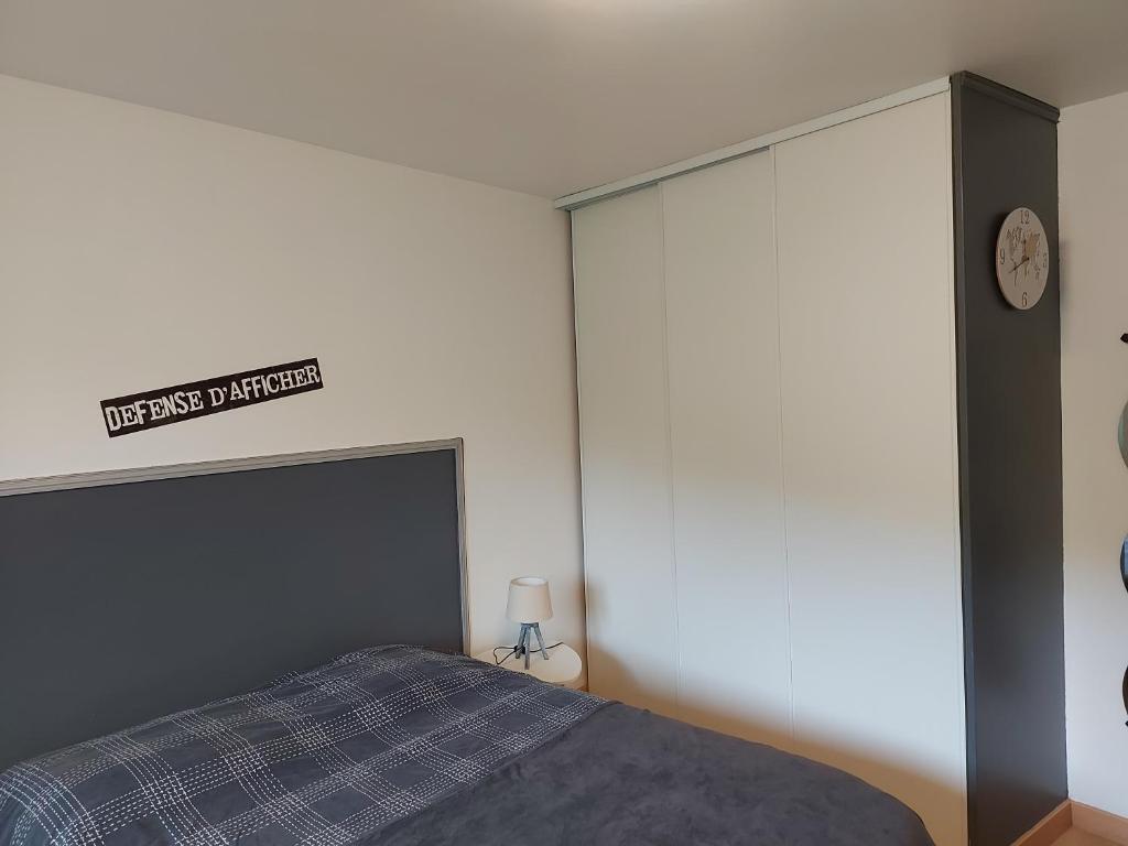 Postel nebo postele na pokoji v ubytování L'Arbonnaise