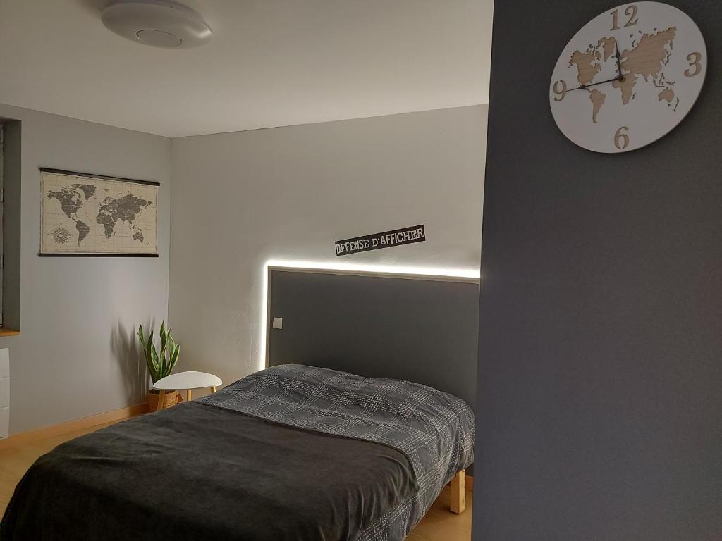 Postel nebo postele na pokoji v ubytování L'Arbonnaise