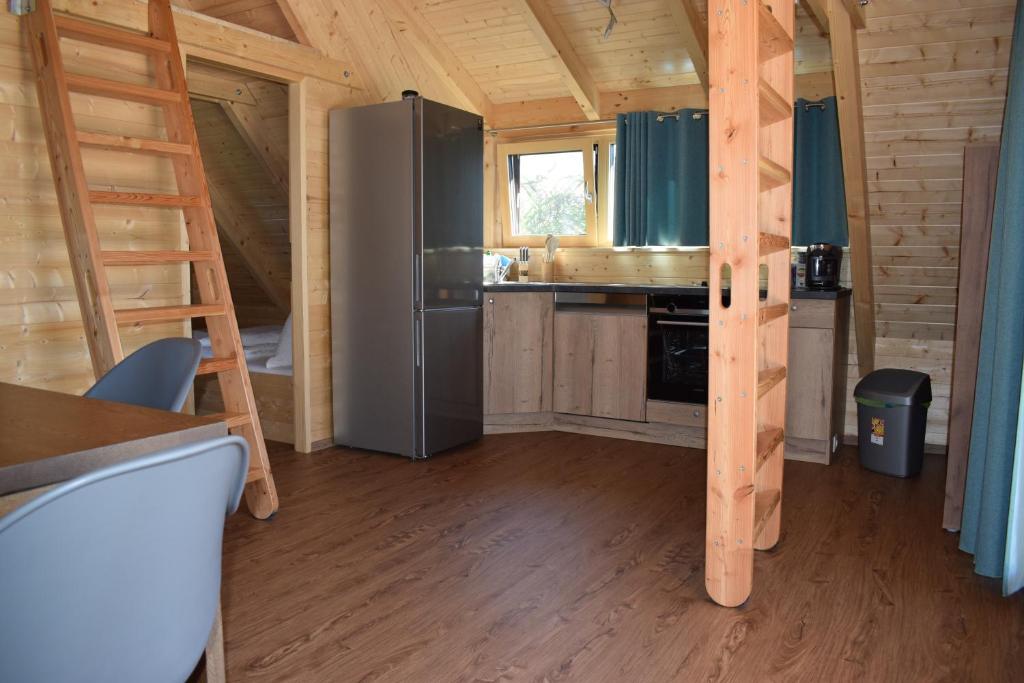 Kuchyň nebo kuchyňský kout v ubytování Chalet im See - Nr 51