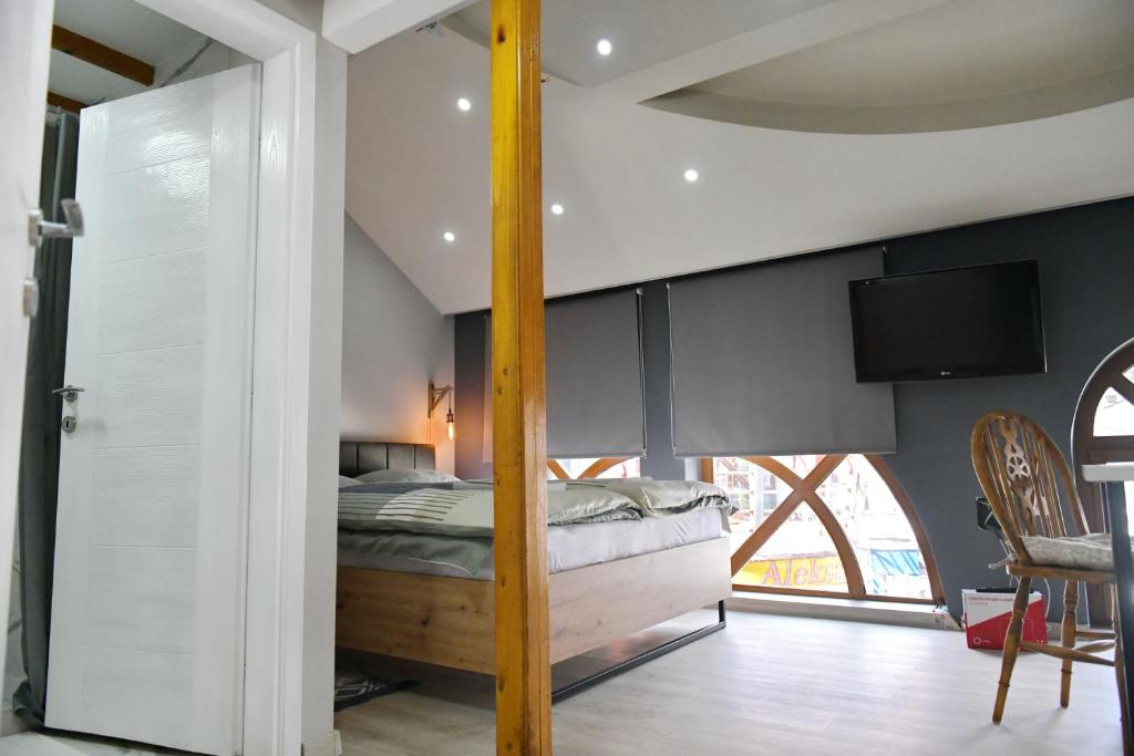Postel nebo postele na pokoji v ubytování Apartman Time out 2