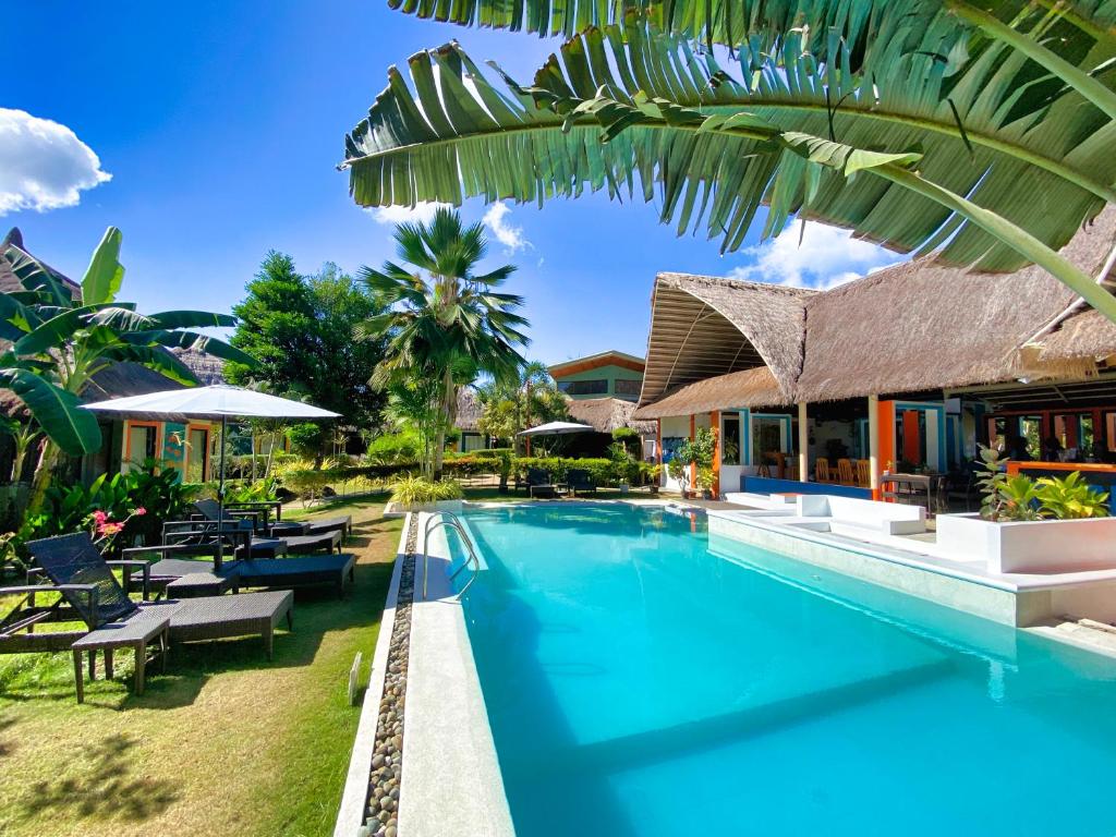 an image of a swimming pool at a resort at Villa Kasadya in Panglao