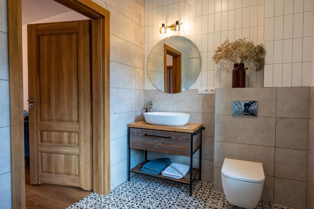 Koupelna v ubytování Apartamenty Otulina