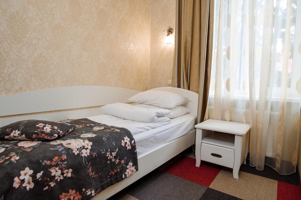 Postel nebo postele na pokoji v ubytování Na Horyzonti