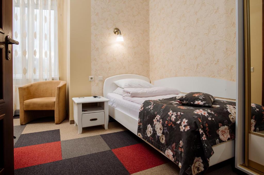 Postel nebo postele na pokoji v ubytování Na Horyzonti