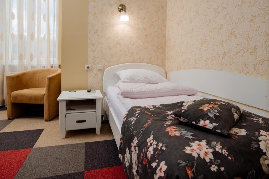 Postel nebo postele na pokoji v ubytování Na Horyzonti