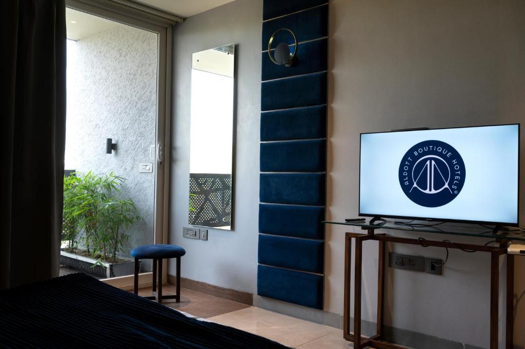 TV a/nebo společenská místnost v ubytování The Aldott Cyber City