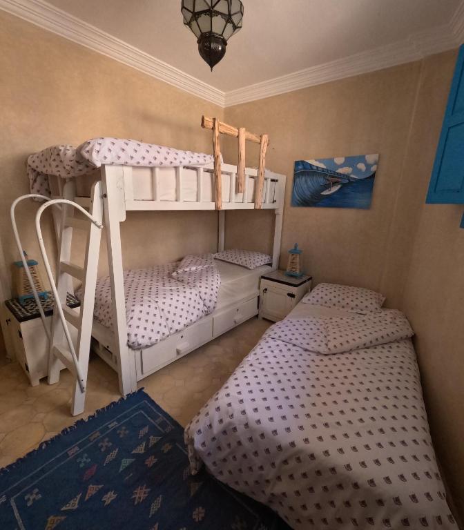 Postel nebo postele na pokoji v ubytování Taghazout Ocean View