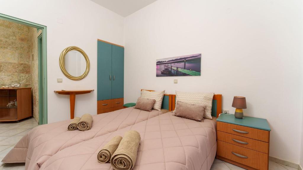 Postel nebo postele na pokoji v ubytování FNK Apartments with Sea View
