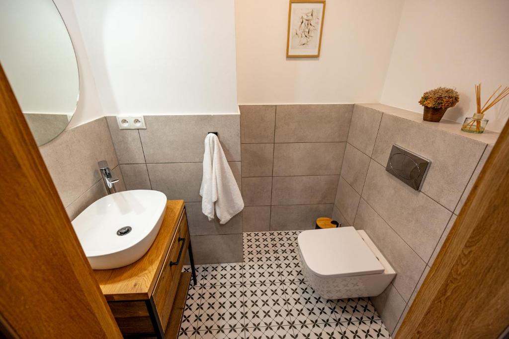 Koupelna v ubytování Apartamenty Otulina