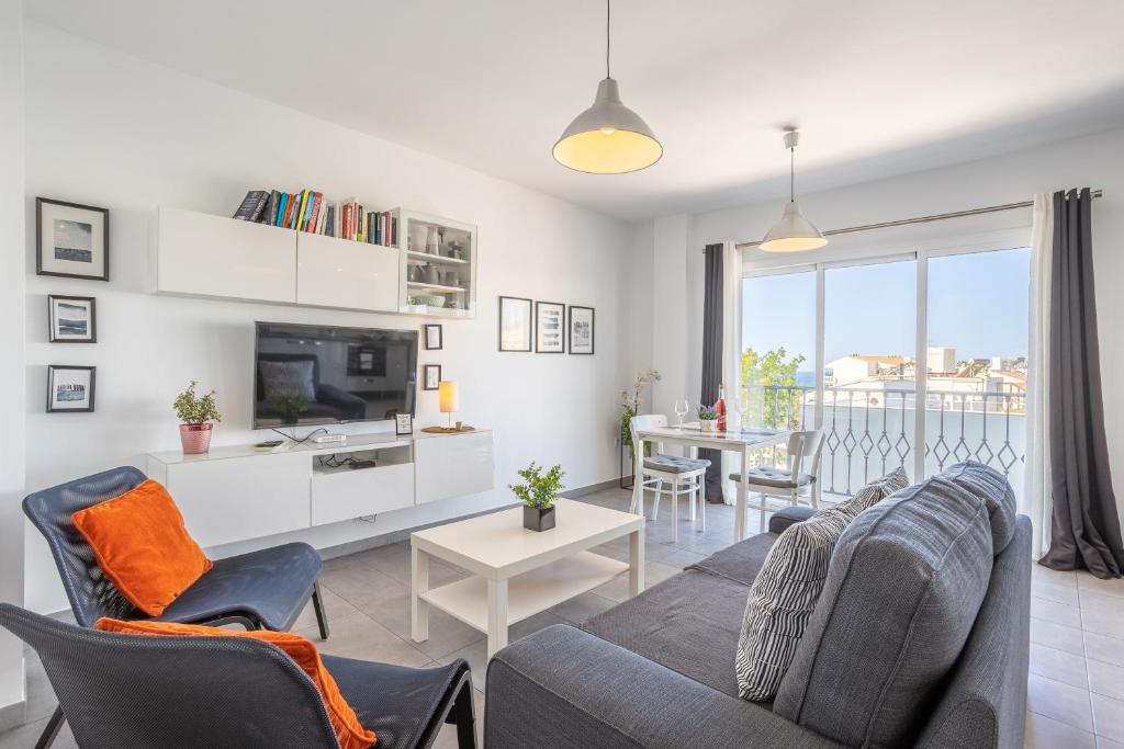 Televízia a/alebo spoločenská miestnosť v ubytovaní Relaxing Cozy Apartment