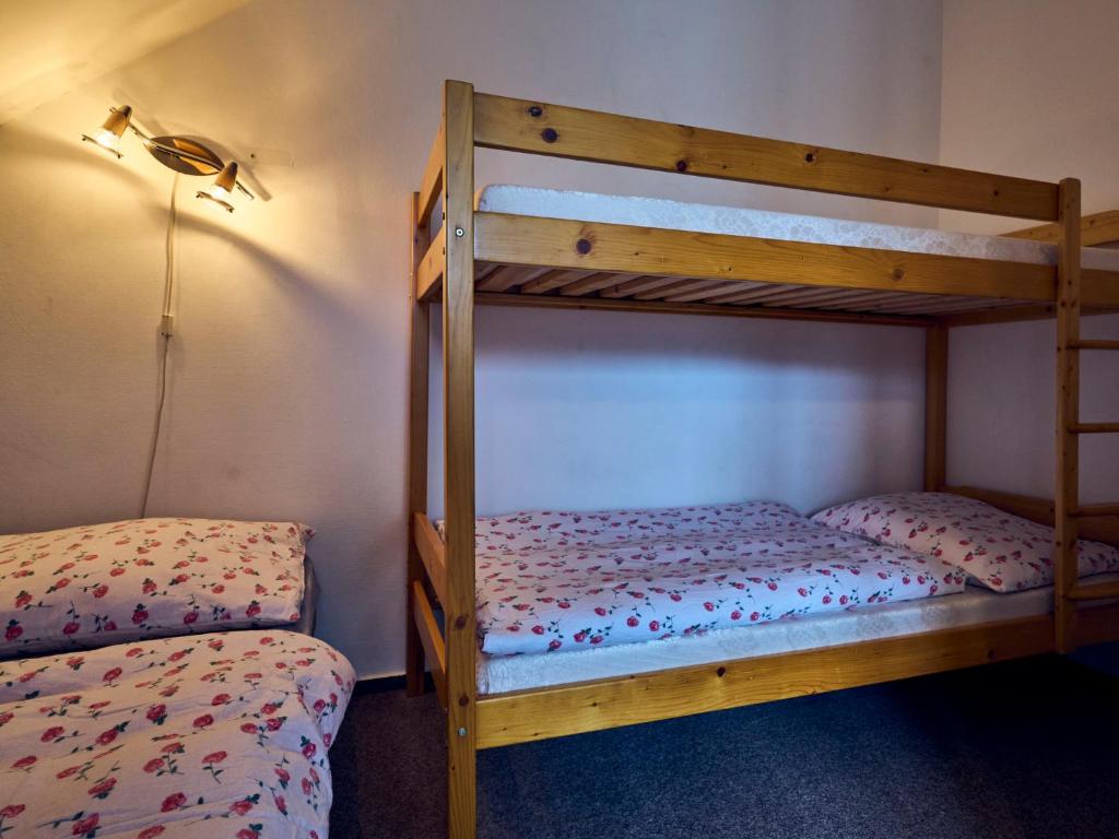 Postel nebo postele na pokoji v ubytování Apartment Apartmán 611 by Interhome
