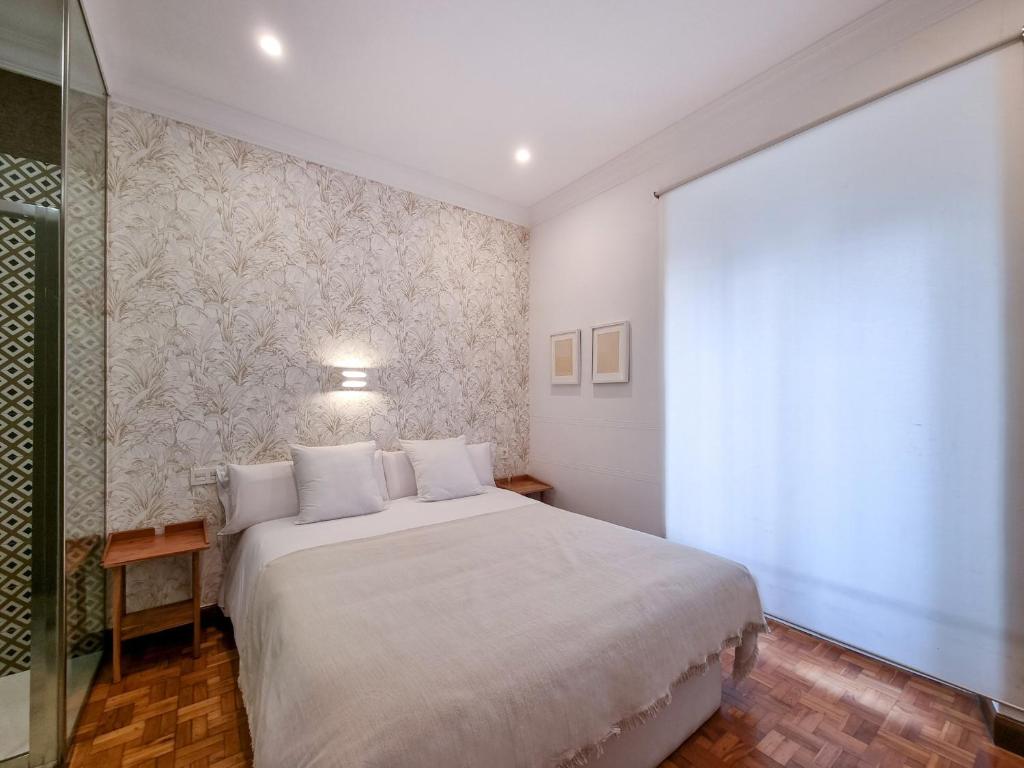Posteľ alebo postele v izbe v ubytovaní Magallanes - Iberorent Apartments
