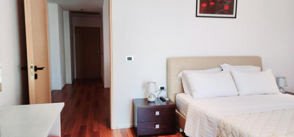 Postel nebo postele na pokoji v ubytování 3B Suites Boutique Hotel