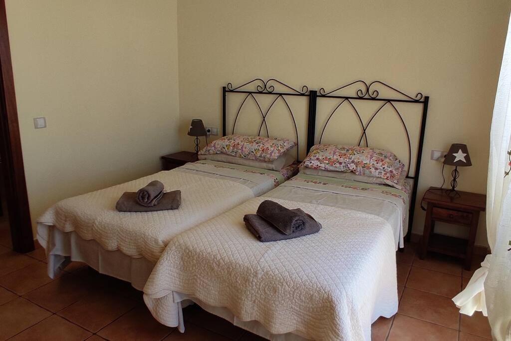 Postel nebo postele na pokoji v ubytování Villa Paraiso, El Sultán, Corralejo, Fuerteventura