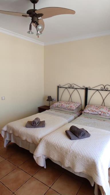 Postel nebo postele na pokoji v ubytování Villa Paraiso, El Sultán, Corralejo, Fuerteventura