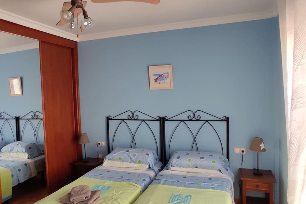 Postel nebo postele na pokoji v ubytování Villa Paraiso, El Sultán, Corralejo, Fuerteventura