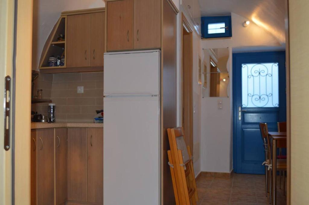 Kuchyň nebo kuchyňský kout v ubytování Tholari project by S.
