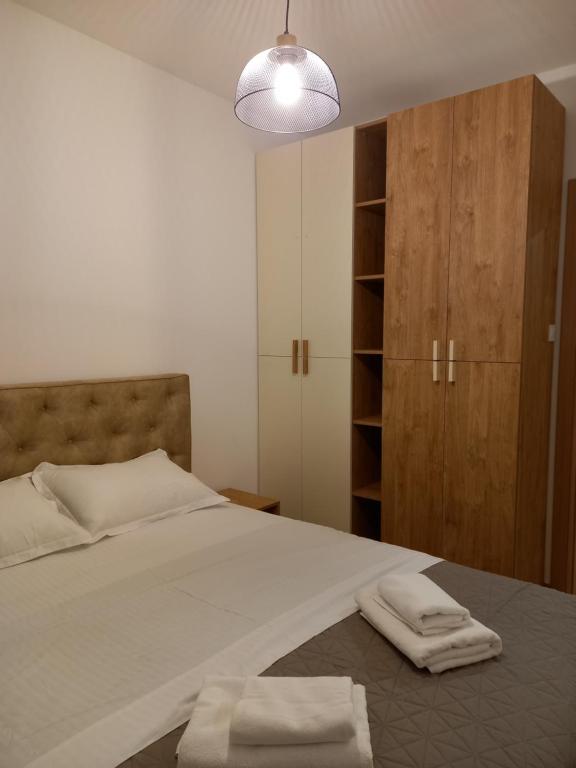 Postel nebo postele na pokoji v ubytování Solaris Apartments