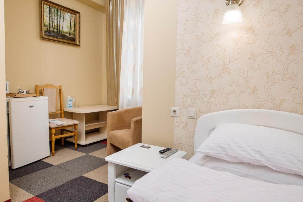 Postel nebo postele na pokoji v ubytování Na Horyzonti