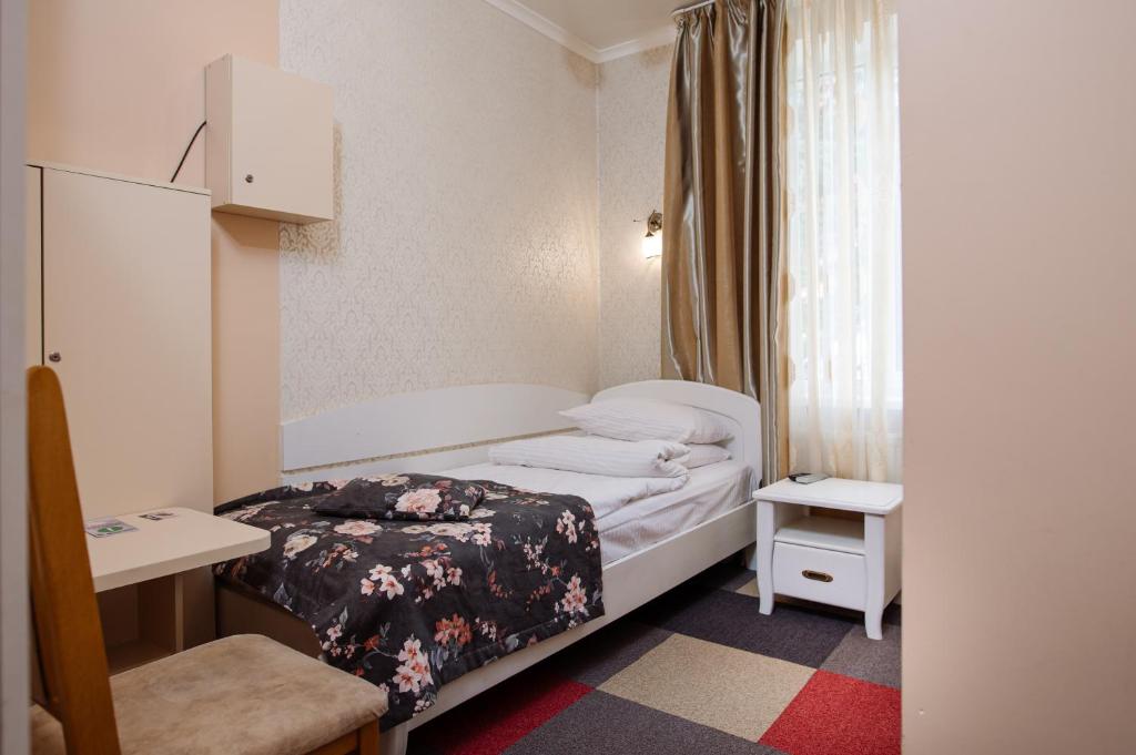 Postel nebo postele na pokoji v ubytování Na Horyzonti