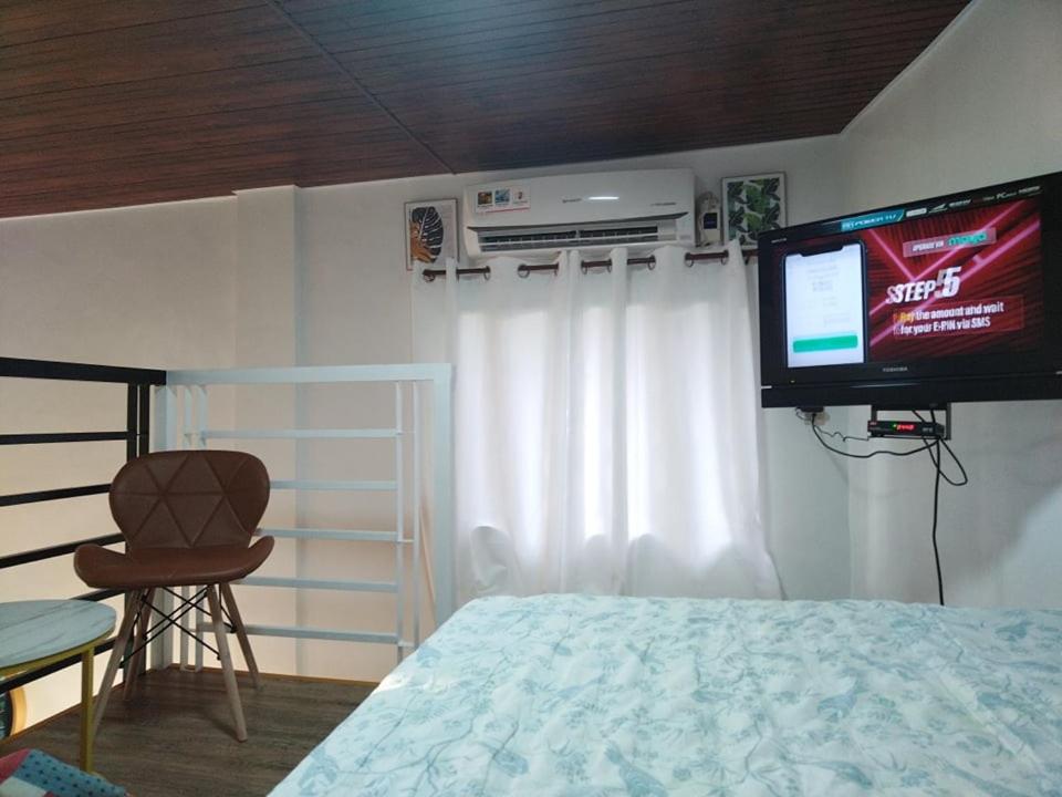 Postel nebo postele na pokoji v ubytování Tiny House Loft Style