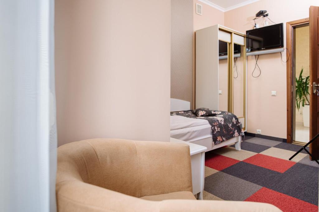 Postel nebo postele na pokoji v ubytování Na Horyzonti