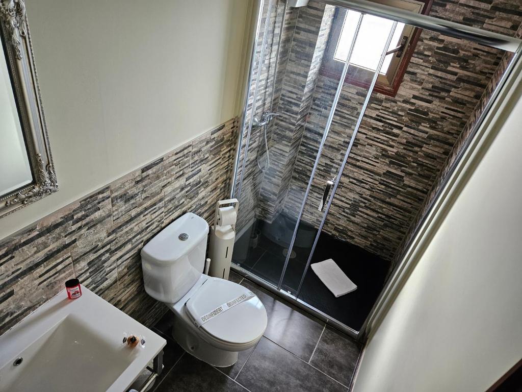 Koupelna v ubytování SEVEN Hostal