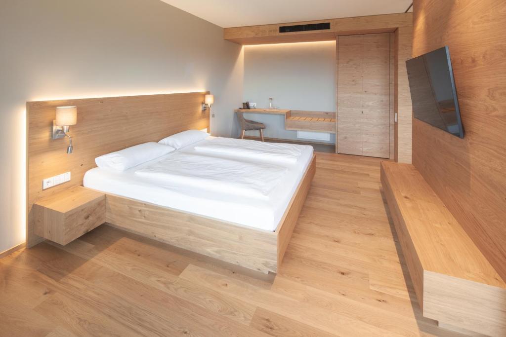 Postel nebo postele na pokoji v ubytování Hotel Munde