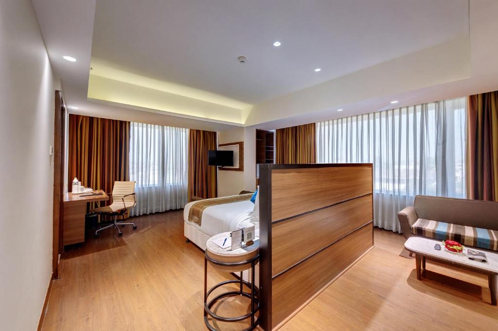 Posezení v ubytování Amarpreet, Chhatrapati Sambhajinagar - AM Hotel Kollection