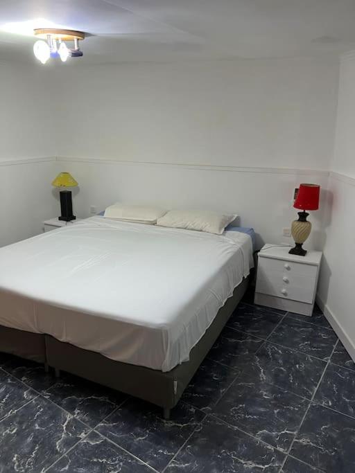 Posteľ alebo postele v izbe v ubytovaní CLAUDIA Puertito de Adeje - 2 bedrooms, 70mq, on the beach