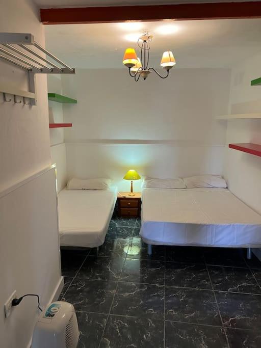 Posteľ alebo postele v izbe v ubytovaní CLAUDIA Puertito de Adeje - 2 bedrooms, 70mq, on the beach