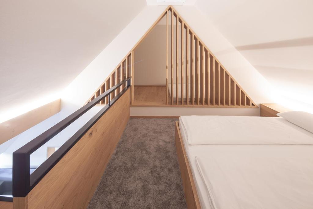 Postel nebo postele na pokoji v ubytování Hotel Munde