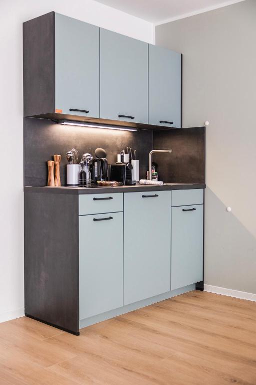 Kuchyň nebo kuchyňský kout v ubytování limehome Villach Hauptplatz
