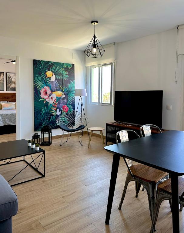Televízia a/alebo spoločenská miestnosť v ubytovaní Bonito Apartamento Mar Azul