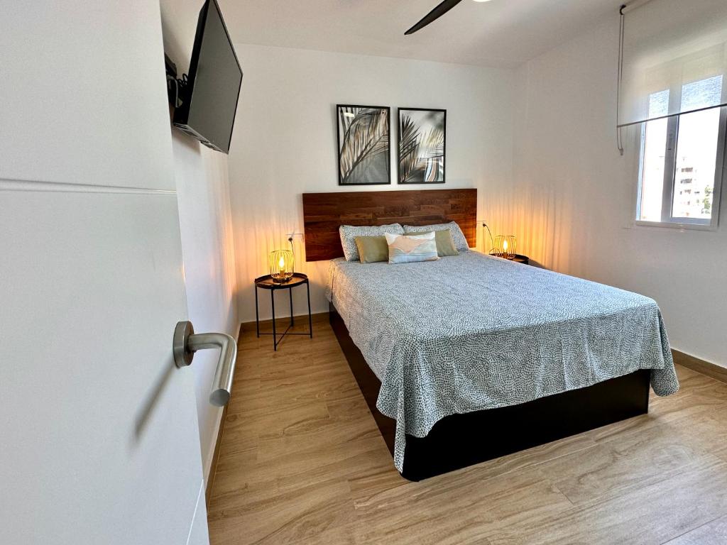 Posteľ alebo postele v izbe v ubytovaní Bonito Apartamento Mar Azul
