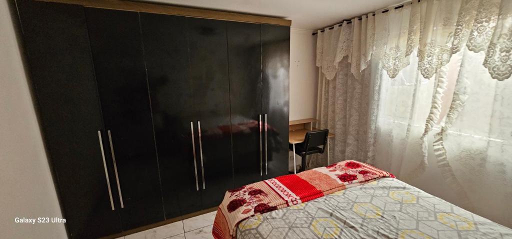 Postel nebo postele na pokoji v ubytování Hostel AJBJ Turismo