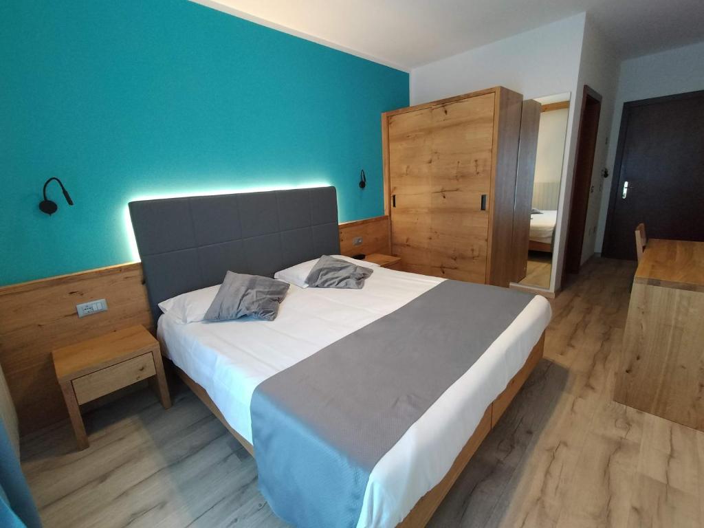 Postel nebo postele na pokoji v ubytování Hotel Angelo