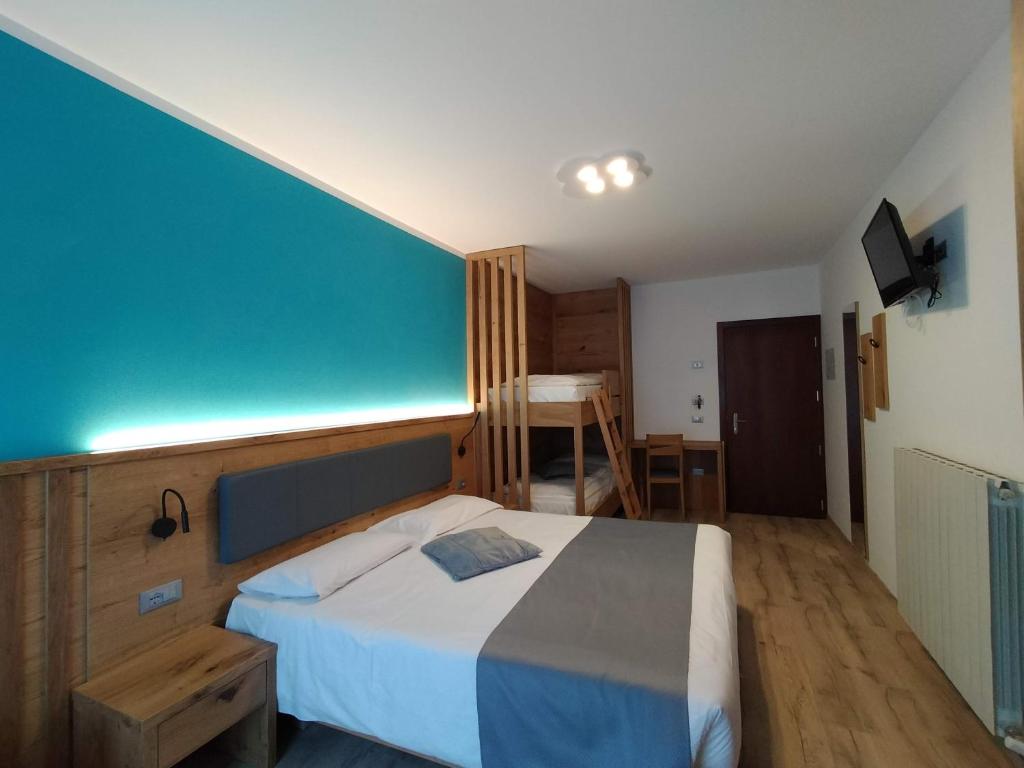Postel nebo postele na pokoji v ubytování Hotel Angelo